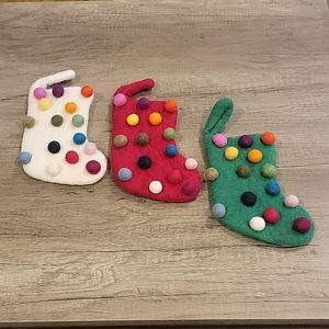 NWT SET OF 3 MINI CHRISTMAS STOCKINGS RED, WHITE, GREEN W/COLORED POMS 8X3IN